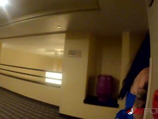Two big titty babes scissoring with a big toy in a hotel room