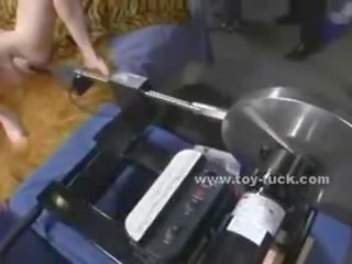 Blonde enchantress with small tits takes off her clothes and sets up testing fucking machines masturbating